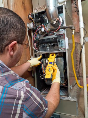 What does a HVAC Repairman do during Heating Unit Maintenance