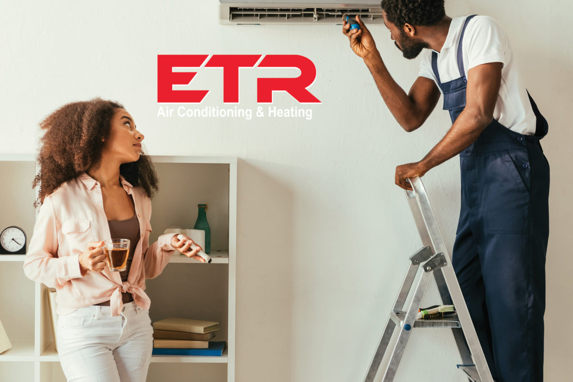 While the girl is waiting, an ETR repairman is working on air conditioning repair. The picture illustrates ETR’s air conditioning repair services in Tyler and Longview.