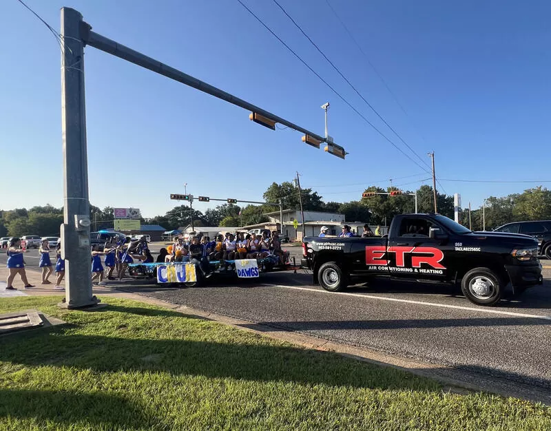 etr participating in the chapel hill high school football parade
